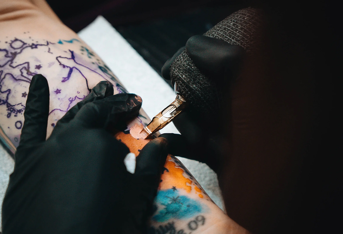 Tattoo artist appointment scene